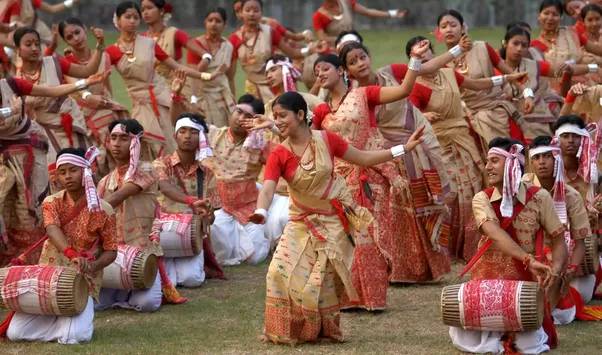 Bihu Dance | India Travel Assamese dancers perform a vibrant Bihu dance with drums during the festival, showcasing Indian culture.