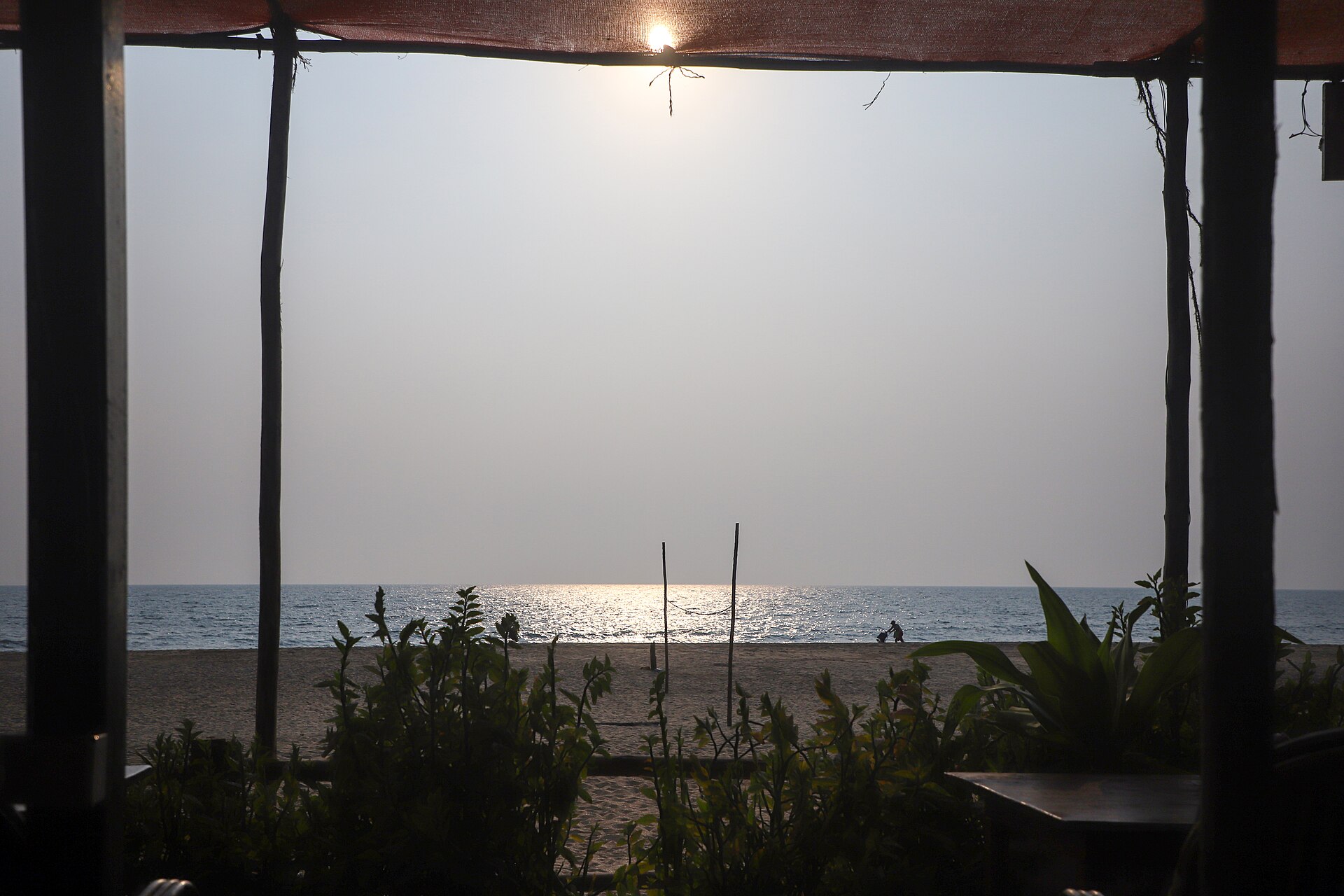 Palolem Beach | The India A beach view in Palolem, Goa with sunlight reflecting on the water.